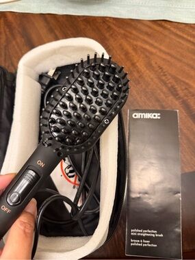 amika Mini Heated Straightening Brush in Black